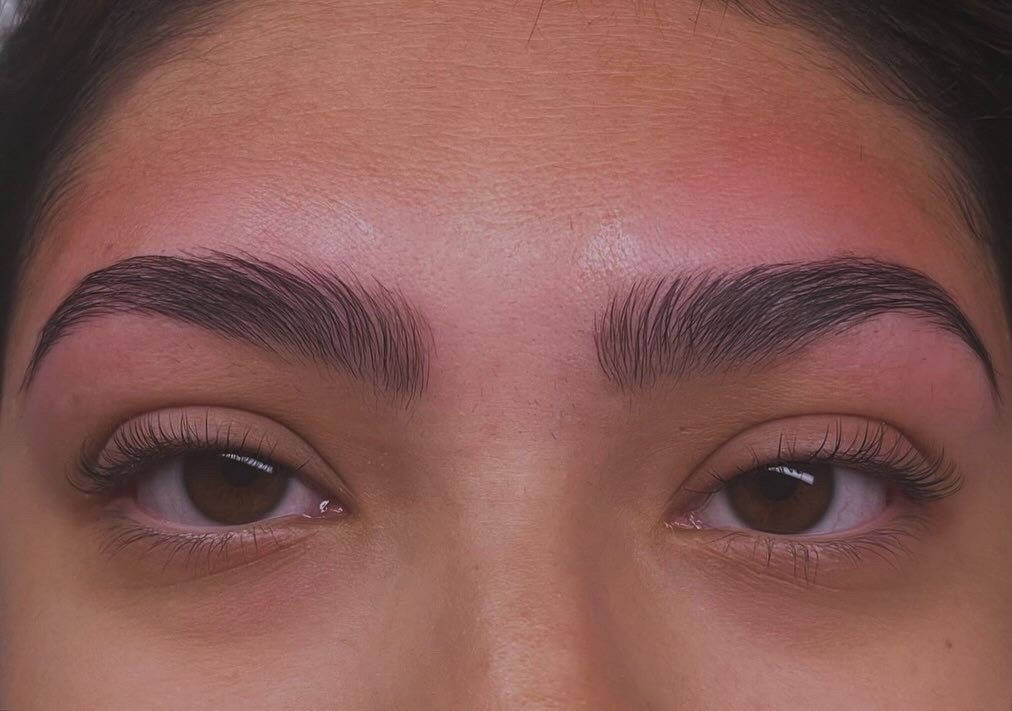 Freshly shaped and defined brows, close-up