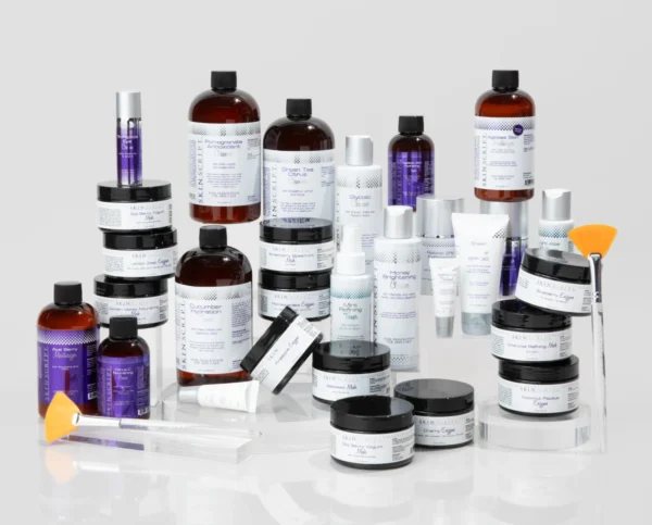 Skin Script Rx products displayed on a clear stand